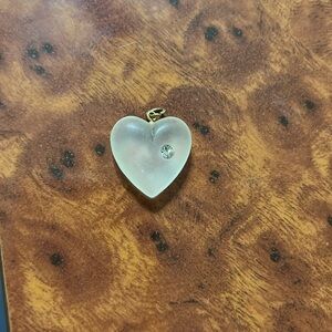 Frosted heart with an adhesive set rhinestone